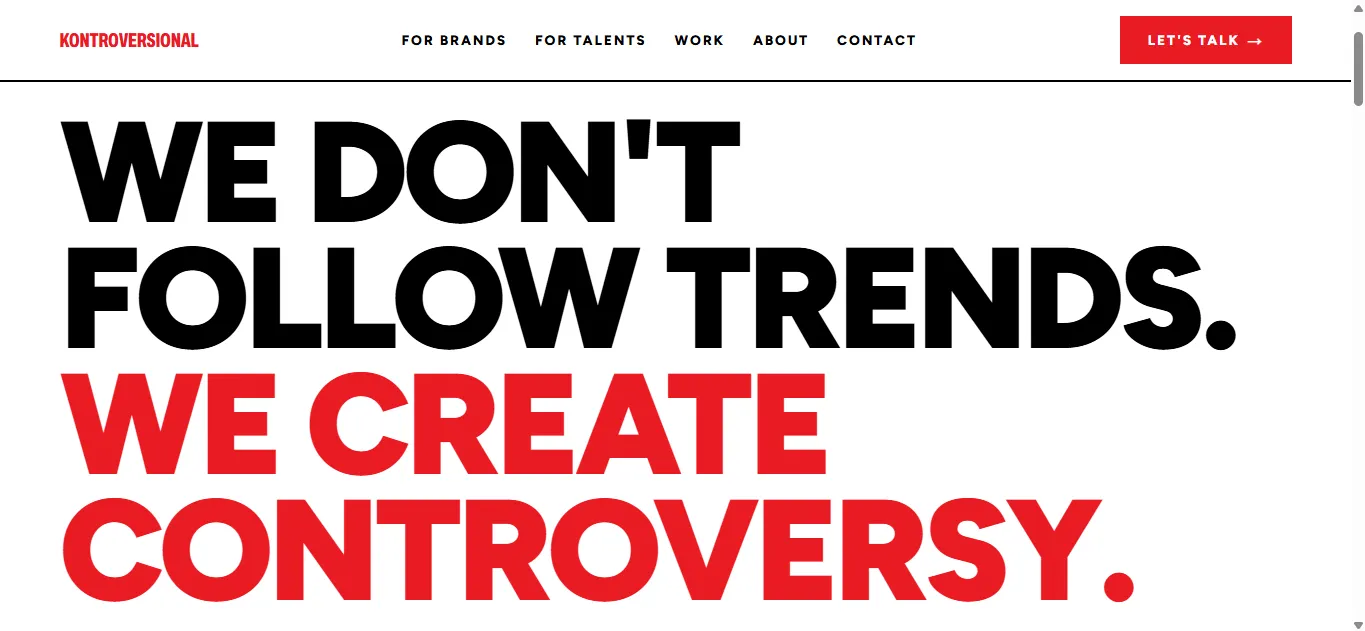 Hero halaman home: headline WE DON’T FOLLOW TRENDS. berwarna hitam diikuti WE CREATE CONTROVERSY. berwarna merah, dengan navigasi dan tombol Let’s Talk di atasnya